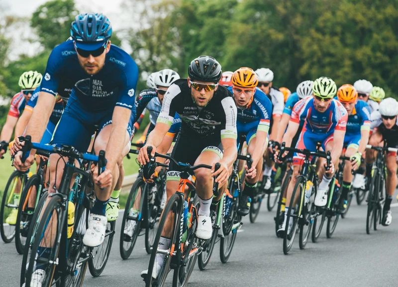 Cyclist riding at sunset